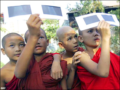 Myanmar Buddhist novices watch